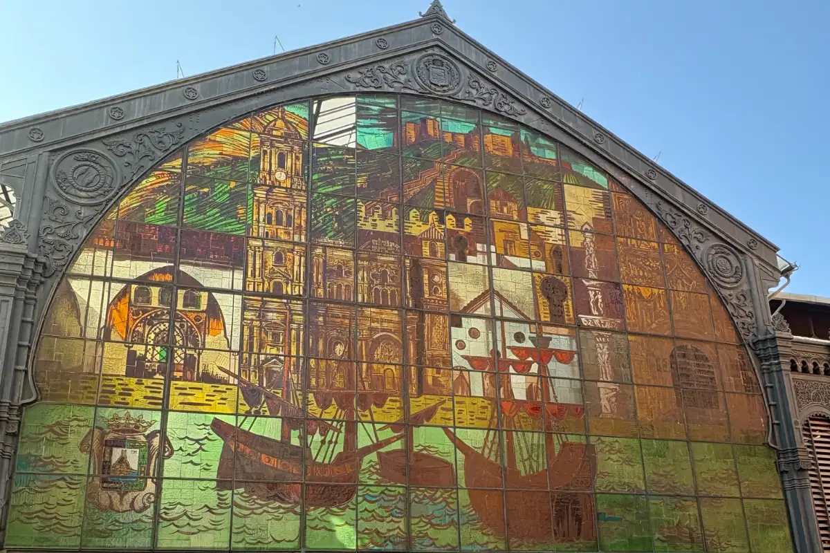The stained, patterned glass windows of Atarazanas market.