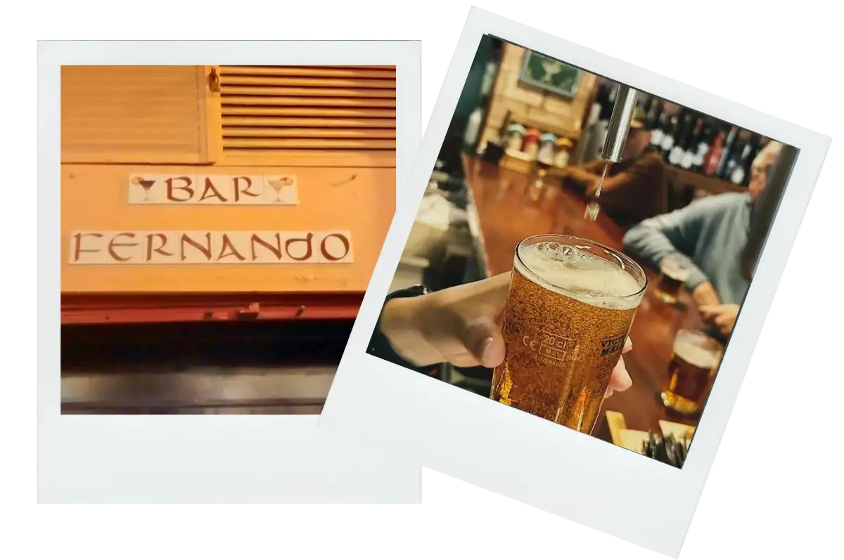 A man holding a beer at Bar Fernando.