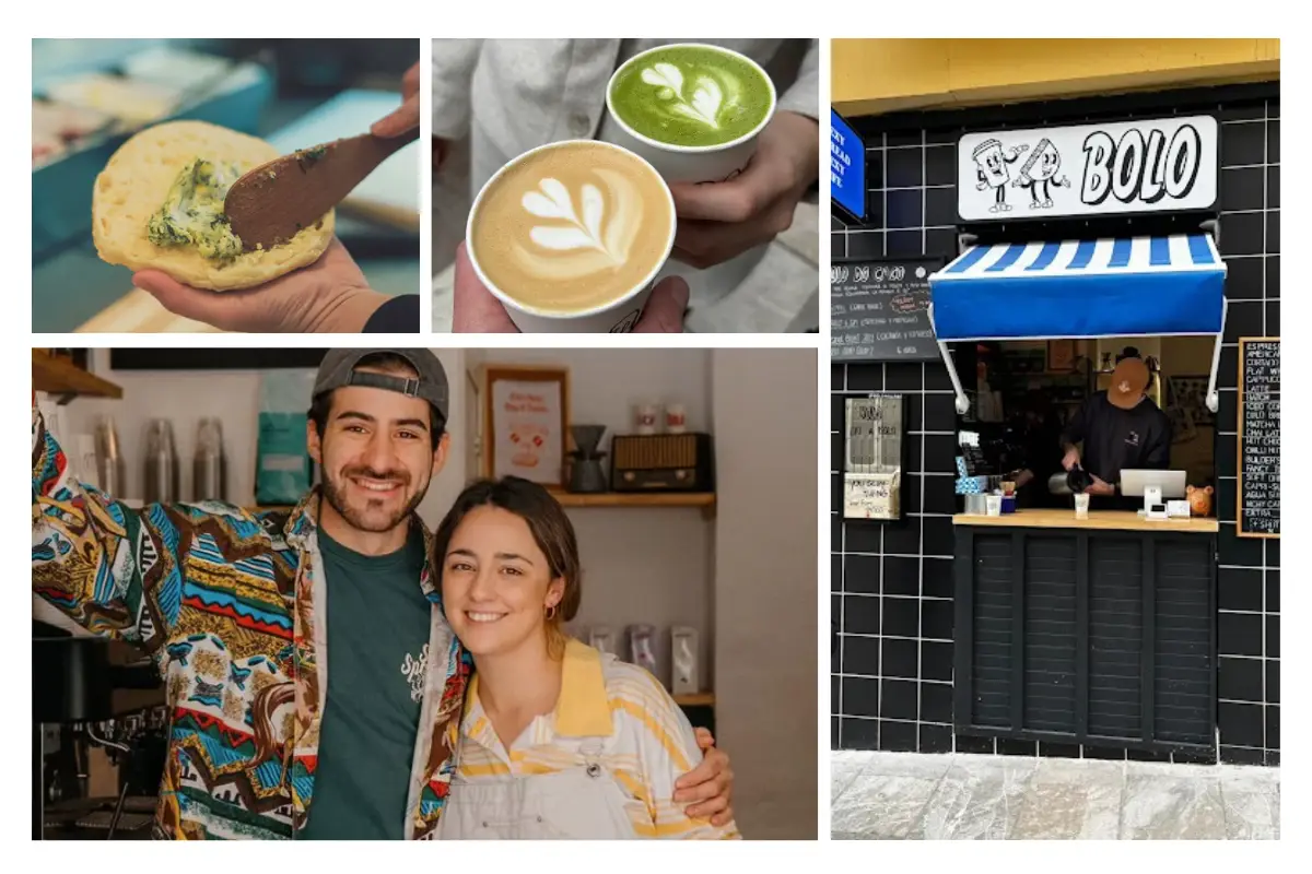 A man and a woman, the owners of Bolo coffee shop in Malaga, are posing inside their shop.