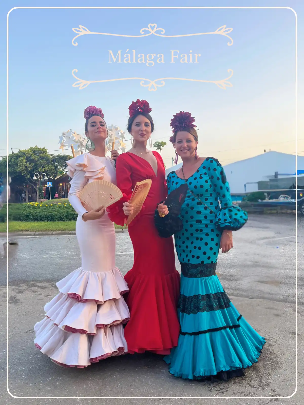 Three women in red, pink and blue-polkadot dresses at the Malaga feria.
