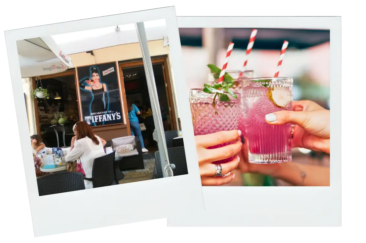 People clinking glasses under an awning in front of the entrance to Tiffany's in Malaga.